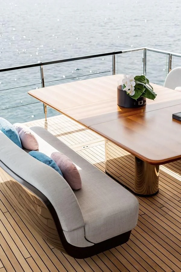 a person lying on a bench aboard AZIMUT GRANDE 26/25 Yacht for Sale