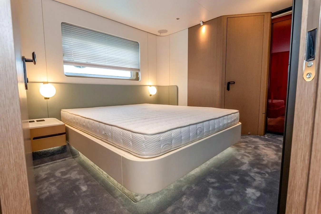 a bed in a room aboard AZIMUT GRANDE 26/25 Yacht for Sale
