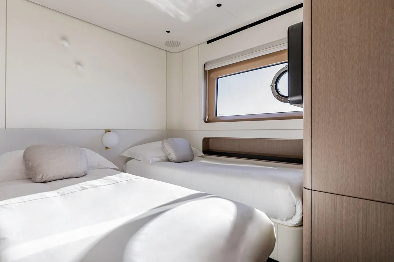 a couple of beds in a room aboard AZIMUT GRANDE 26/25 Yacht for Sale