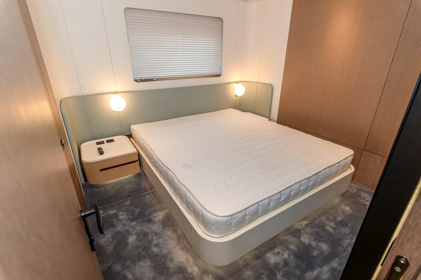 a bed in a room aboard AZIMUT GRANDE 26/25 Yacht for Sale