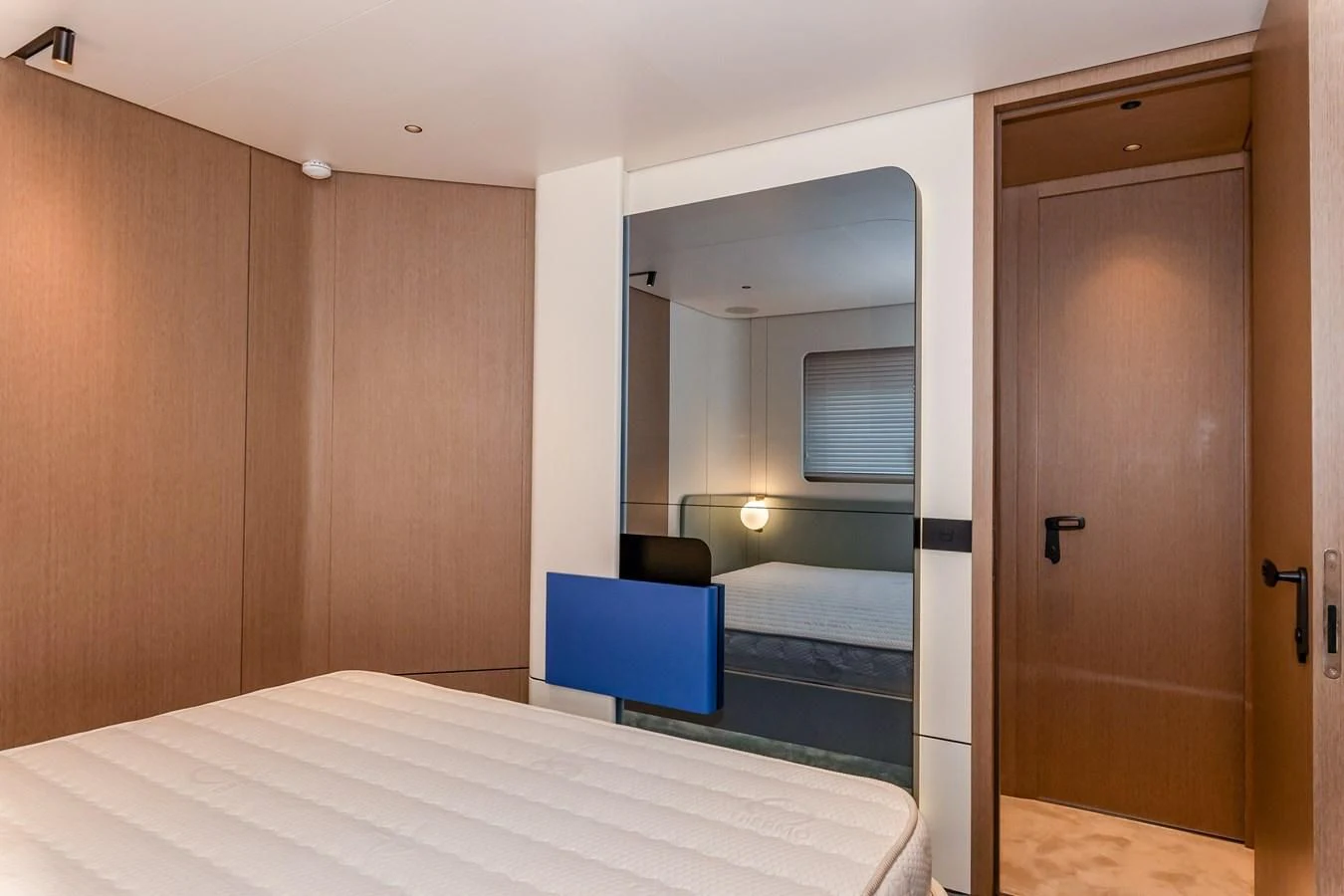 a room with a bed and a closet aboard AZIMUT GRANDE 26/25 Yacht for Sale