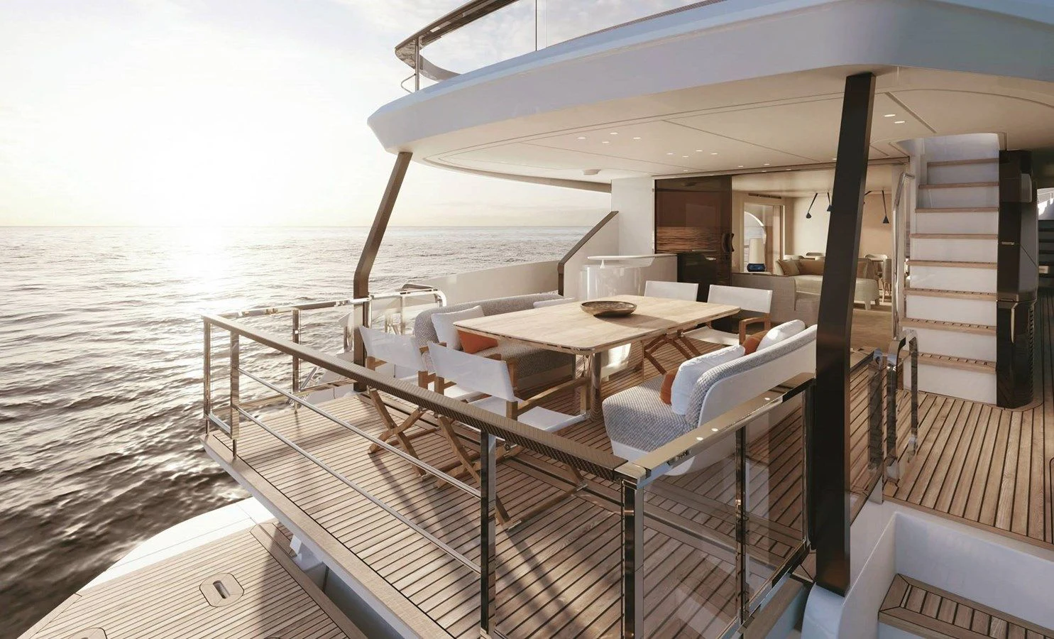 a deck with a table and chairs on it aboard AZIMUT GRANDE 26/25 Yacht for Sale