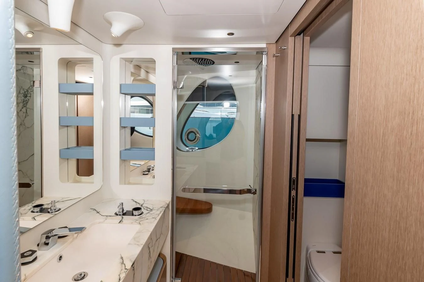 a bathroom with a large mirror aboard AZIMUT GRANDE 26/25 Yacht for Sale