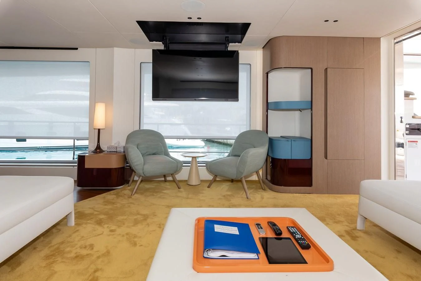 a living room with a table and chairs aboard AZIMUT GRANDE 26/25 Yacht for Sale