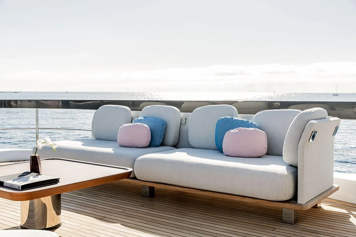 a couch with a pillow on it aboard AZIMUT GRANDE 26/25 Yacht for Sale