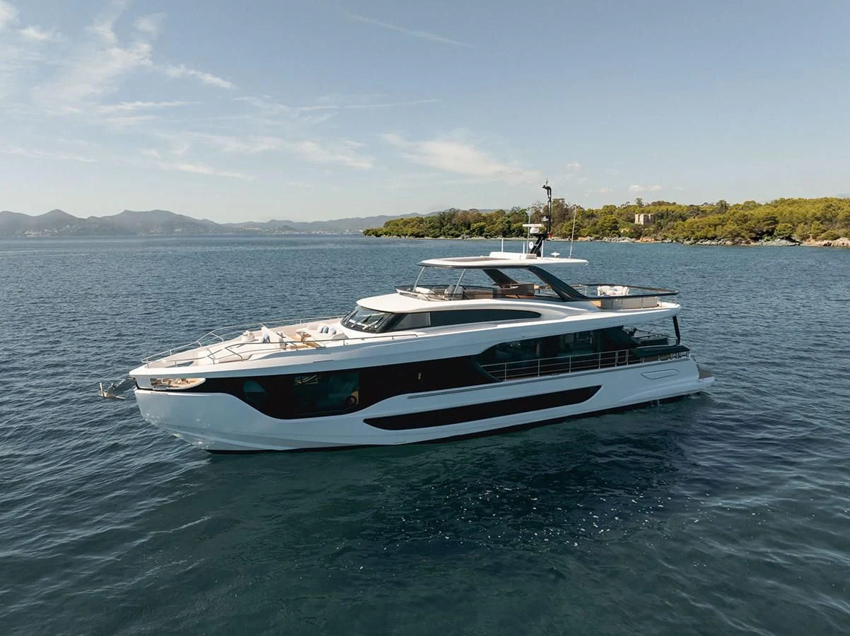 a white boat on water aboard AZIMUT GRANDE 26/25 Yacht for Sale