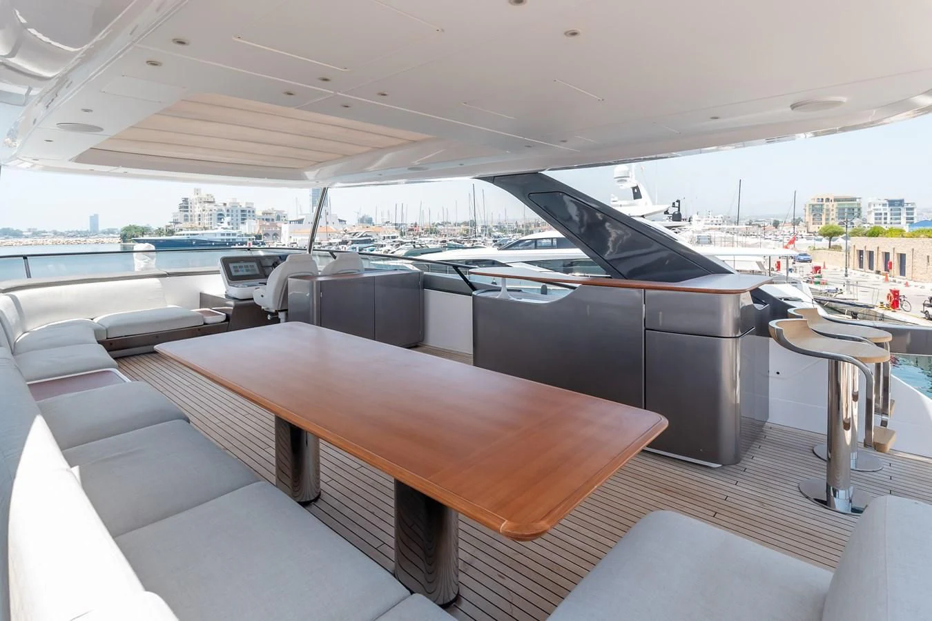 a large room with a table and chairs aboard AZIMUT GRANDE 26/25 Yacht for Sale