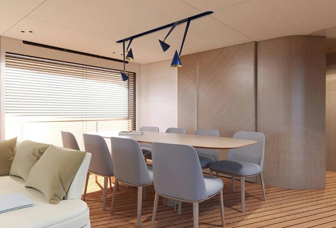 a room with a table and chairs aboard AZIMUT GRANDE 26/25 Yacht for Sale