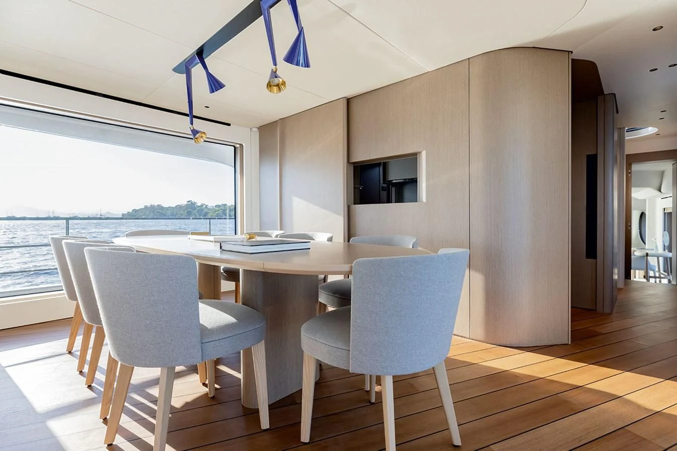 a room with a table and chairs aboard AZIMUT GRANDE 26/25 Yacht for Sale