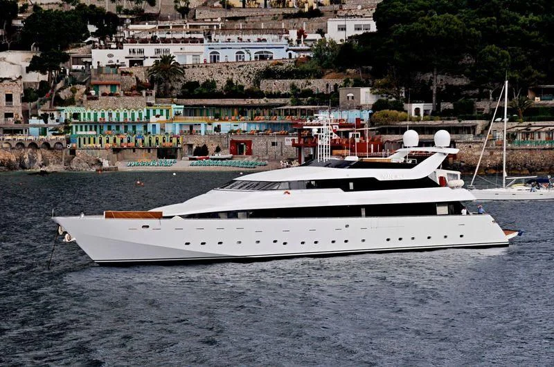 a white yacht in the water aboard IMAN Yacht for Sale