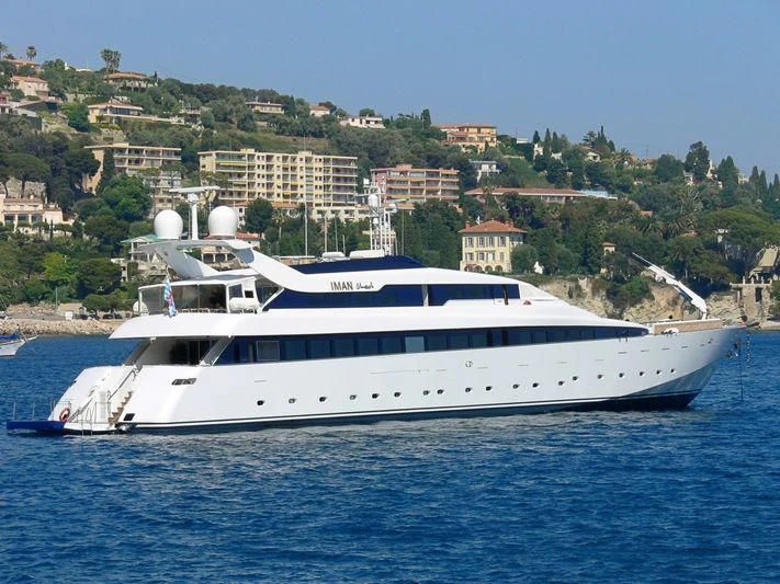 a white yacht in the water aboard IMAN Yacht for Sale