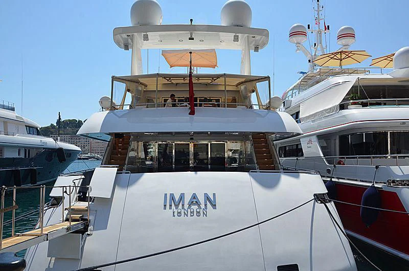 a boat with a canopy aboard IMAN Yacht for Sale