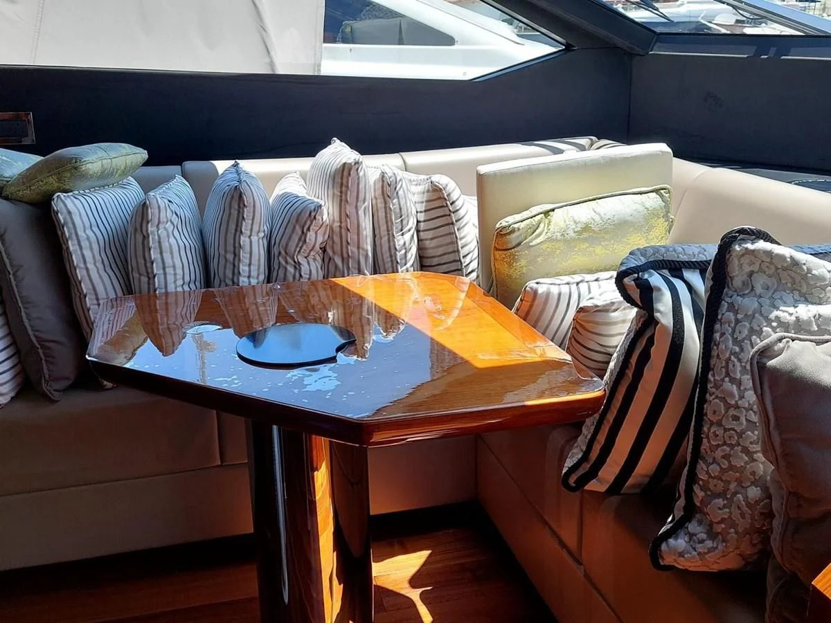 a table with a plate on it aboard SUNSEEKER 75 YACHT Yacht for Sale