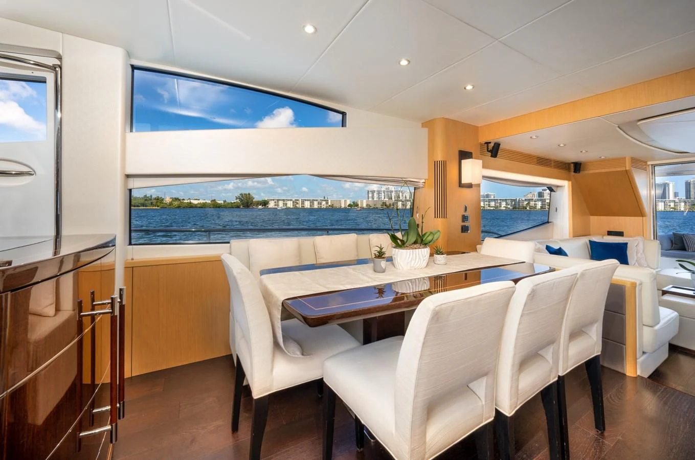 a room with a table chairs and a window aboard SUNSEEKER 75 YACHT Yacht for Sale