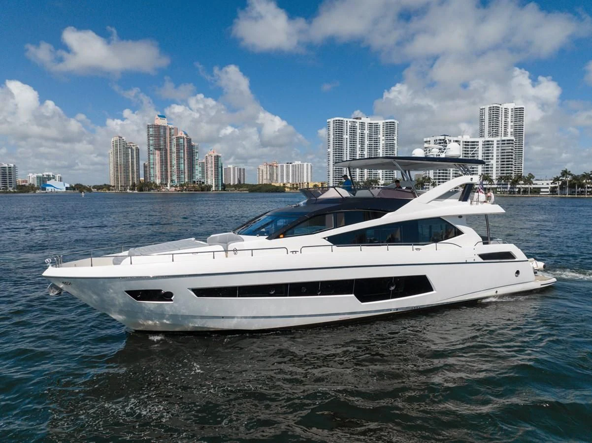 a white yacht in the water aboard SUNSEEKER 75 YACHT Yacht for Sale