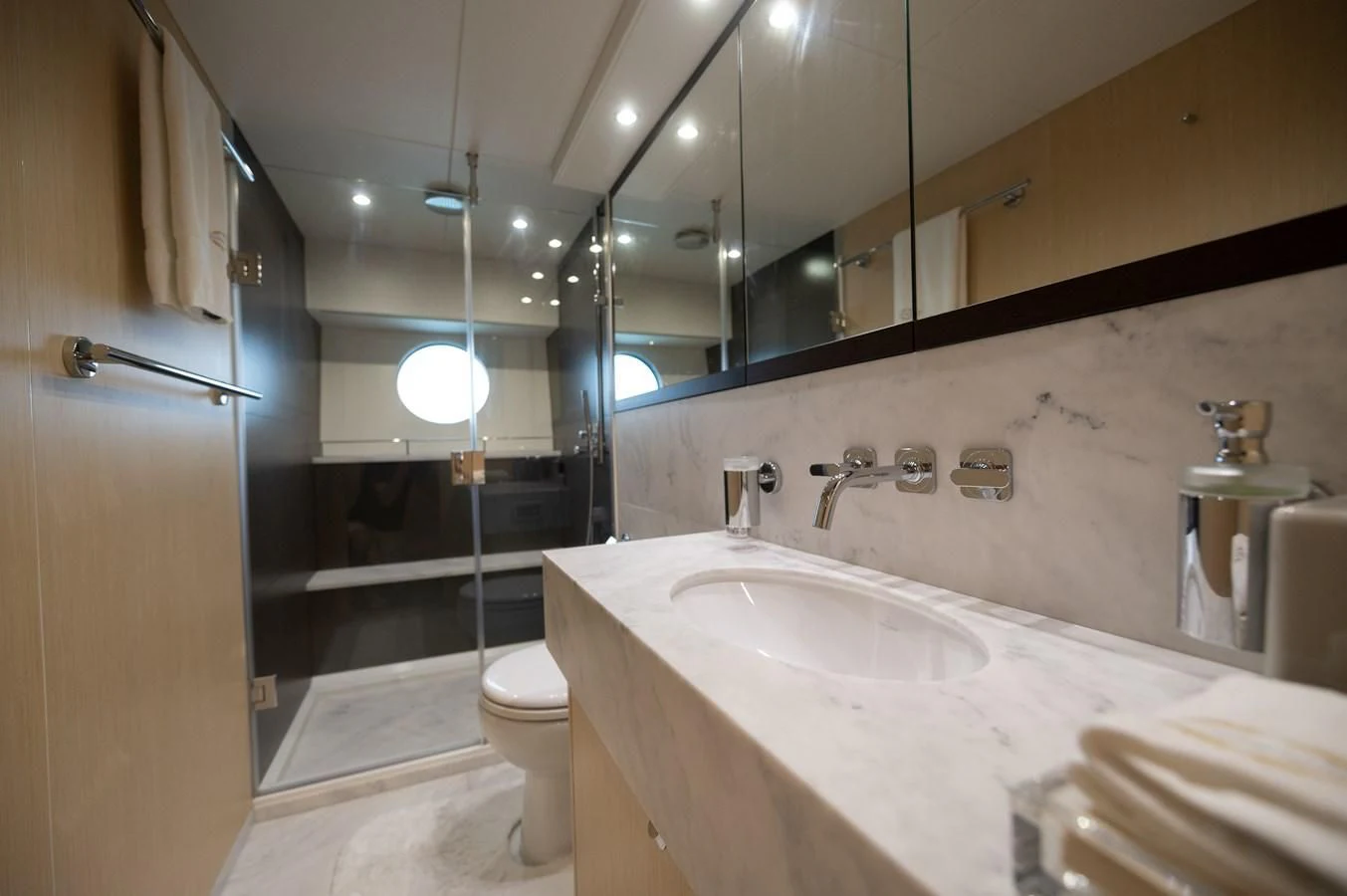 a bathroom with a sink and toilet aboard SUNSEEKER 75 YACHT Yacht for Sale