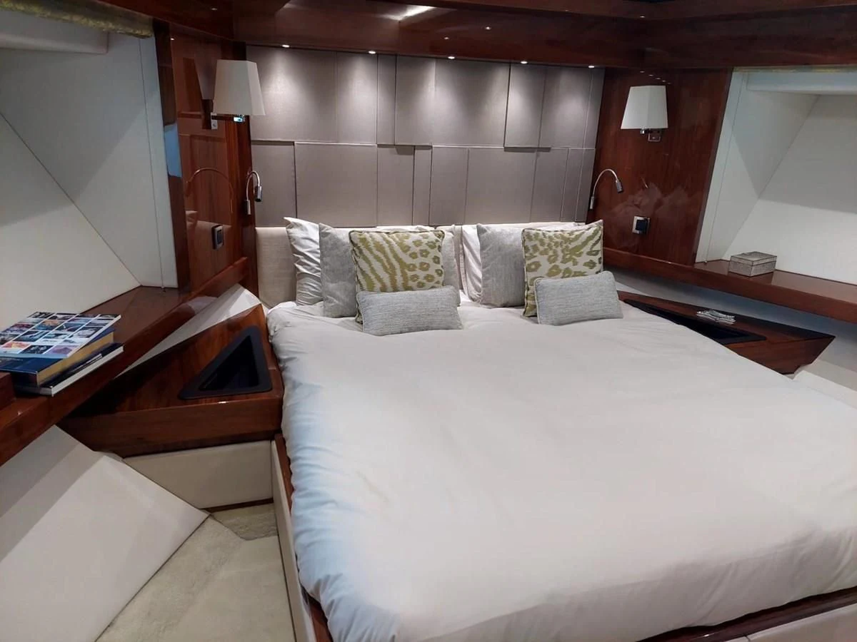 a bed with pillows aboard SUNSEEKER 75 YACHT Yacht for Sale