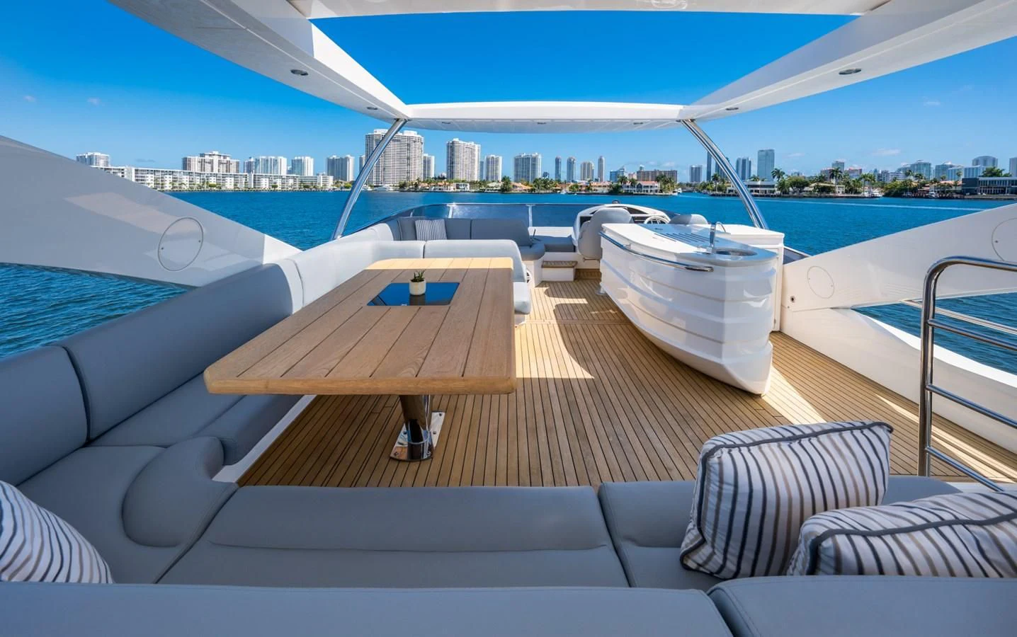 a deck with a view of a city and water aboard SUNSEEKER 75 YACHT Yacht for Sale