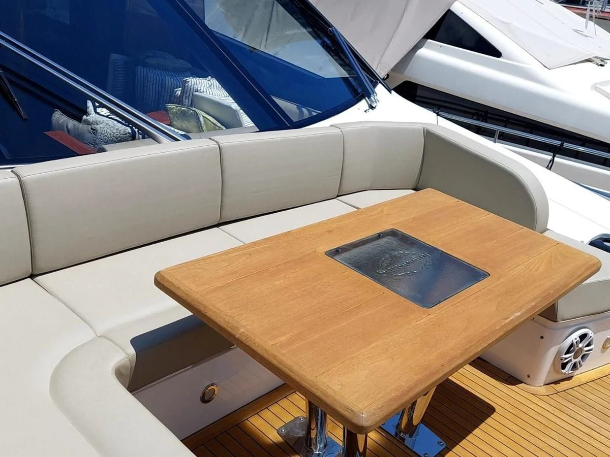 a wooden table in a car aboard SUNSEEKER 75 YACHT Yacht for Sale