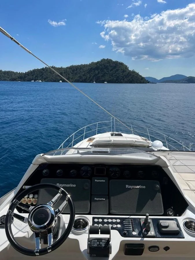 a boat on the water aboard SUNSEEKER 75 YACHT Yacht for Sale