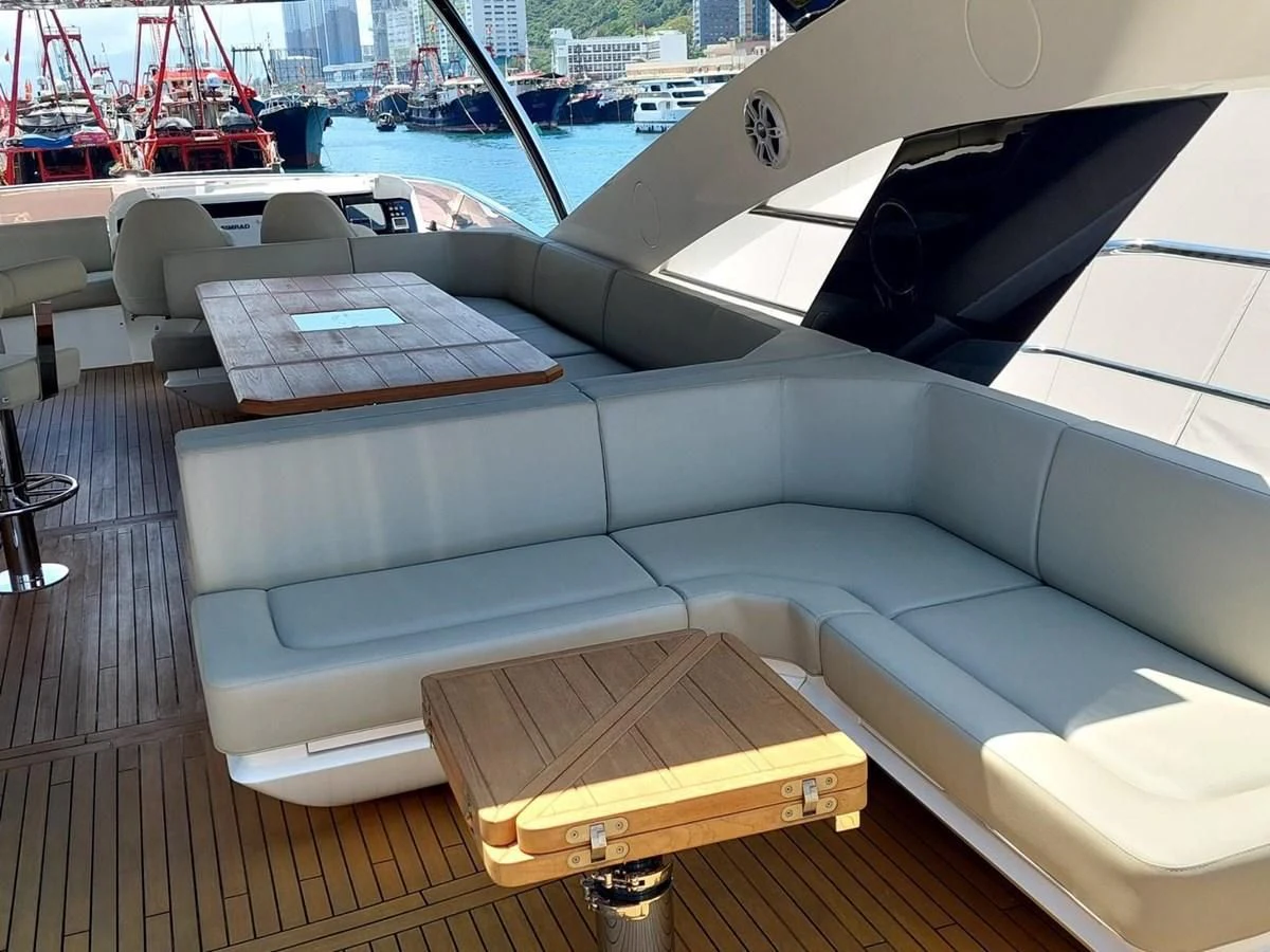 a couch with a table on it aboard SUNSEEKER 75 YACHT Yacht for Sale