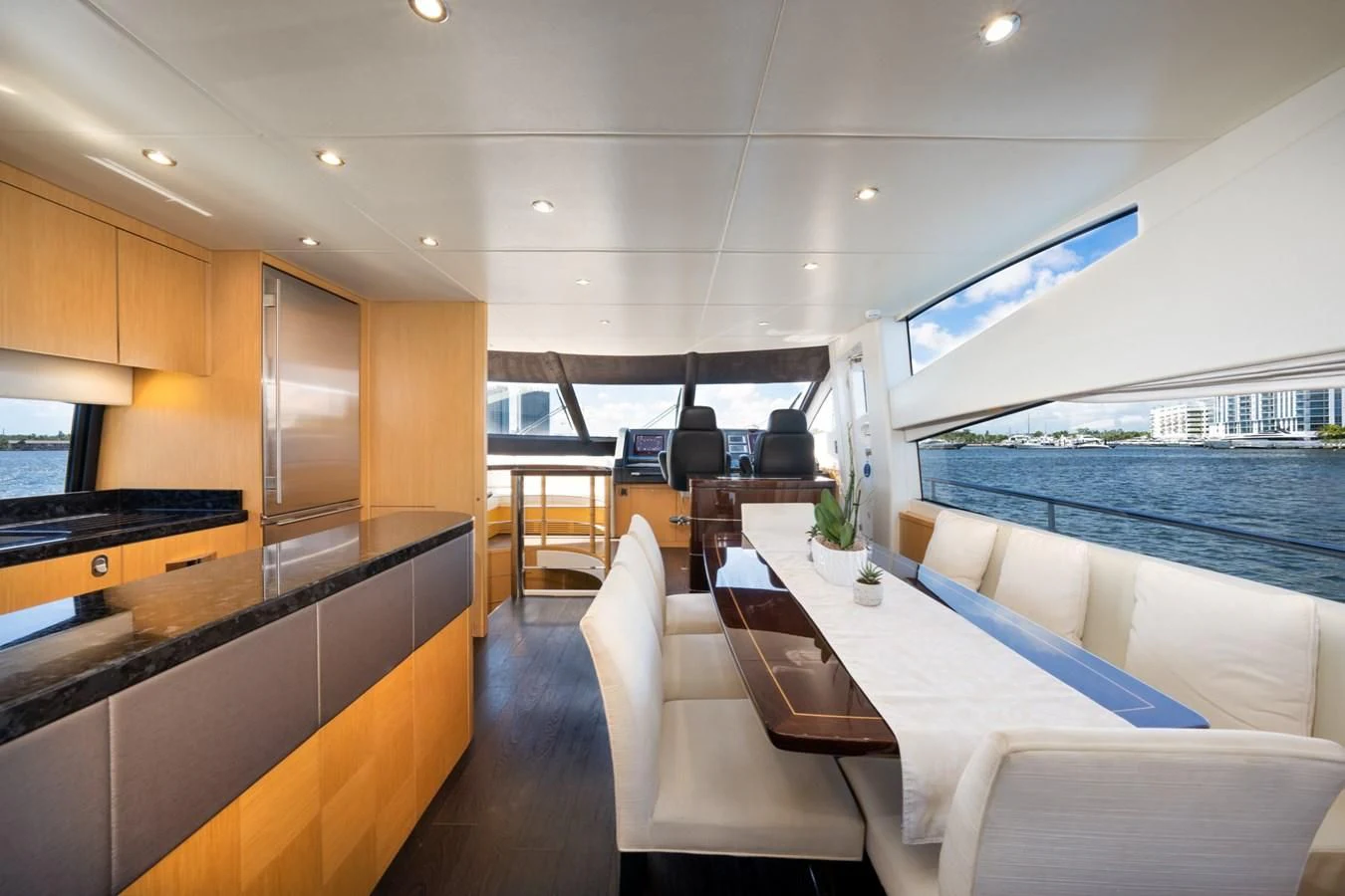 a modern looking kitchen with a large open floor plan aboard SUNSEEKER 75 YACHT Yacht for Sale