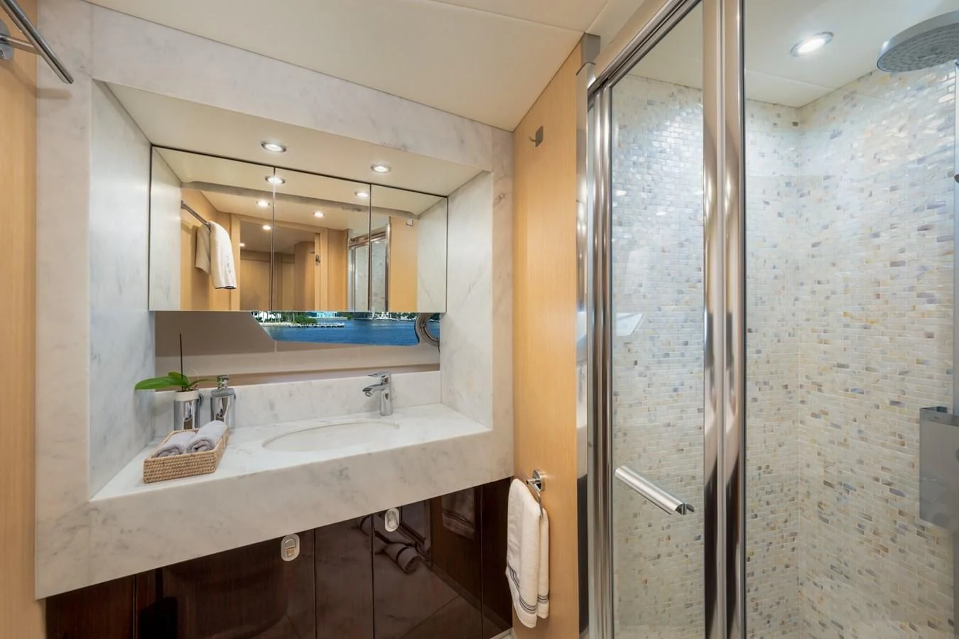 a bathroom with a sink and a shower aboard SUNSEEKER 75 YACHT Yacht for Sale