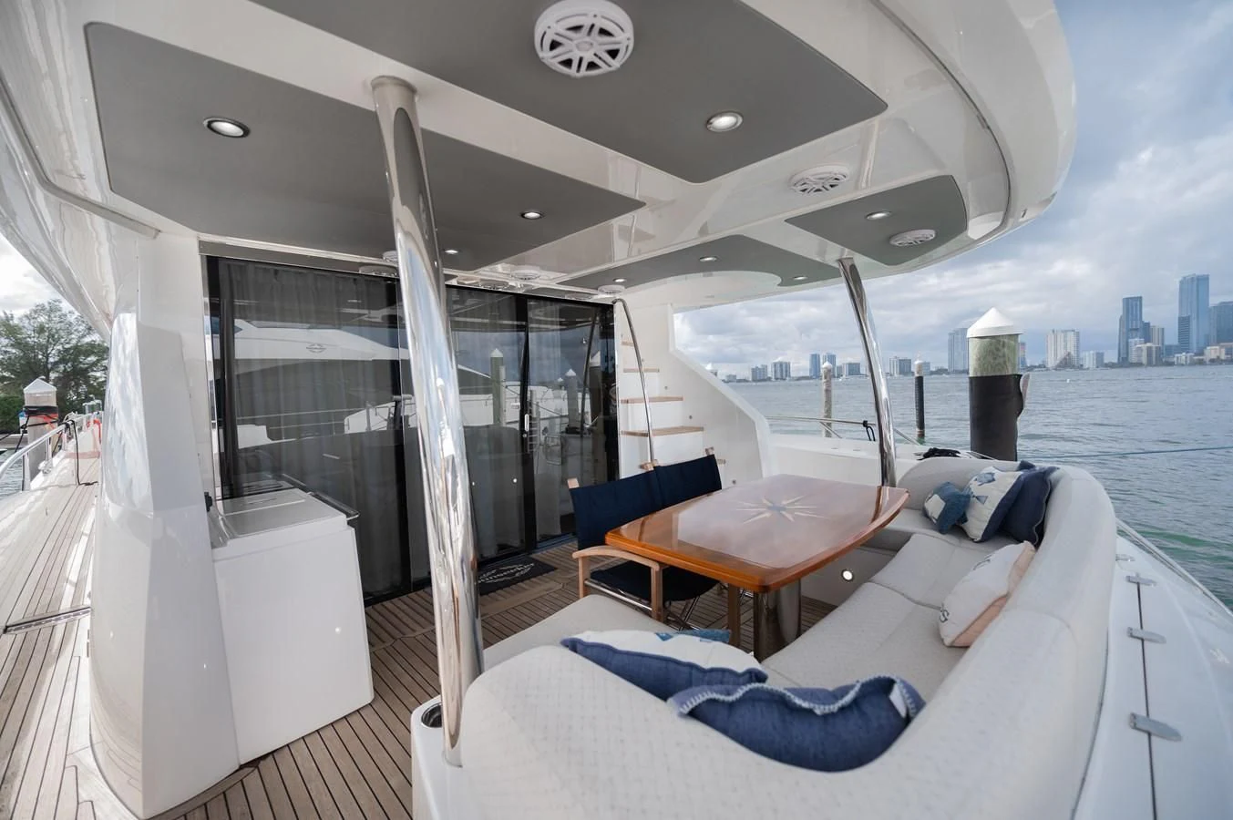 a room with a bed and a table on a boat aboard SUNSEEKER 75 YACHT Yacht for Sale