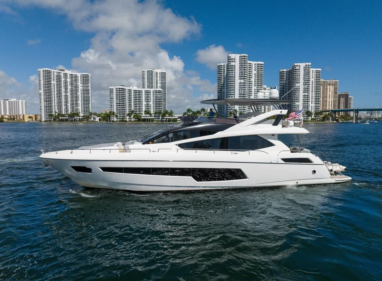 a white yacht in the water aboard SUNSEEKER 75 YACHT Yacht for Sale