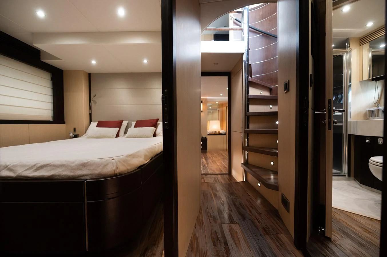 a room with a bed and a ladder aboard SUNSEEKER 75 YACHT Yacht for Sale
