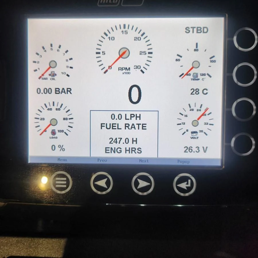 a screen with a clock aboard SUNSEEKER 75 YACHT Yacht for Sale