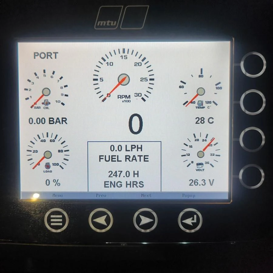 a screen with a clock aboard SUNSEEKER 75 YACHT Yacht for Sale