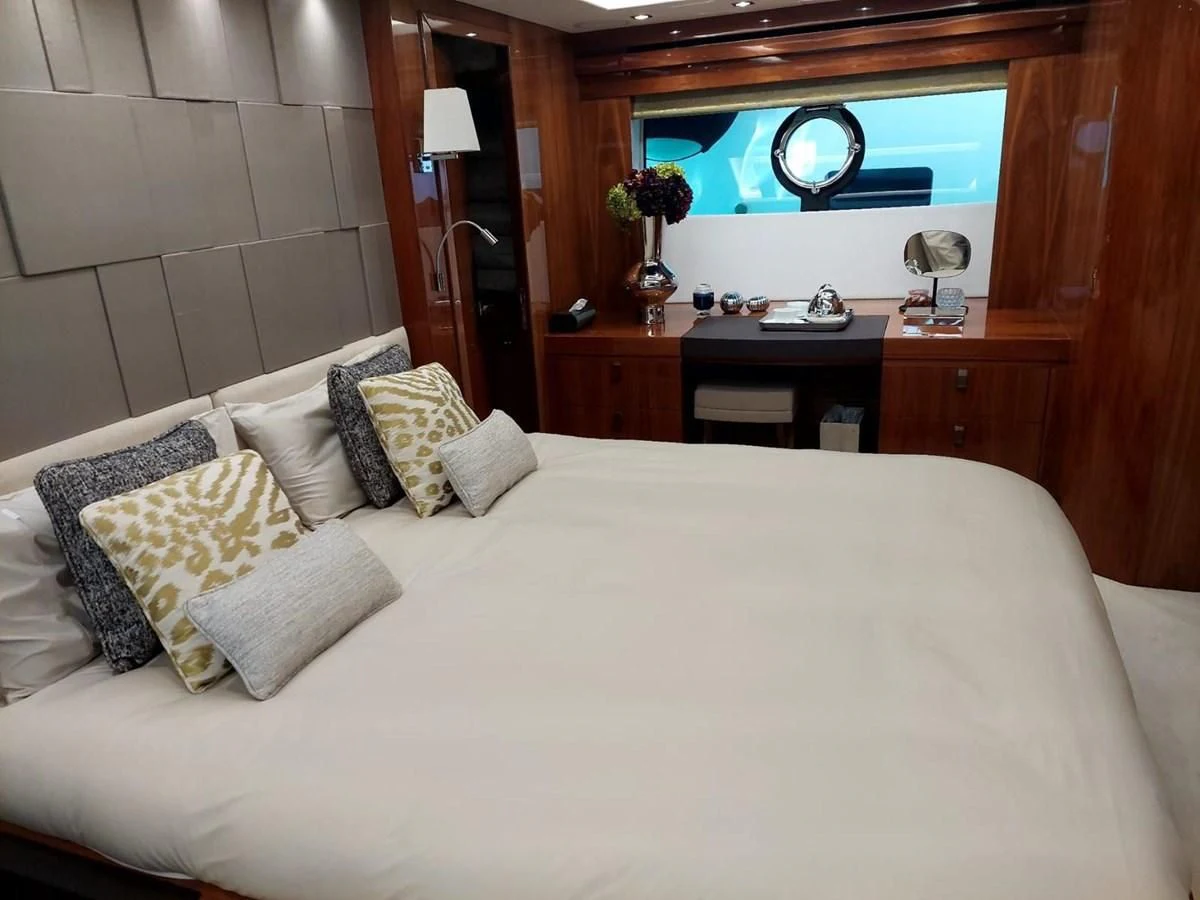 a bed with pillows and pillows aboard SUNSEEKER 75 YACHT Yacht for Sale