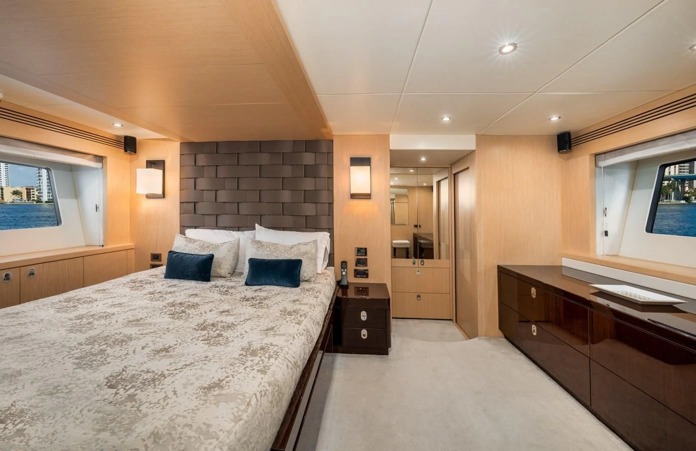a large bedroom with a large bed aboard SUNSEEKER 75 YACHT Yacht for Sale