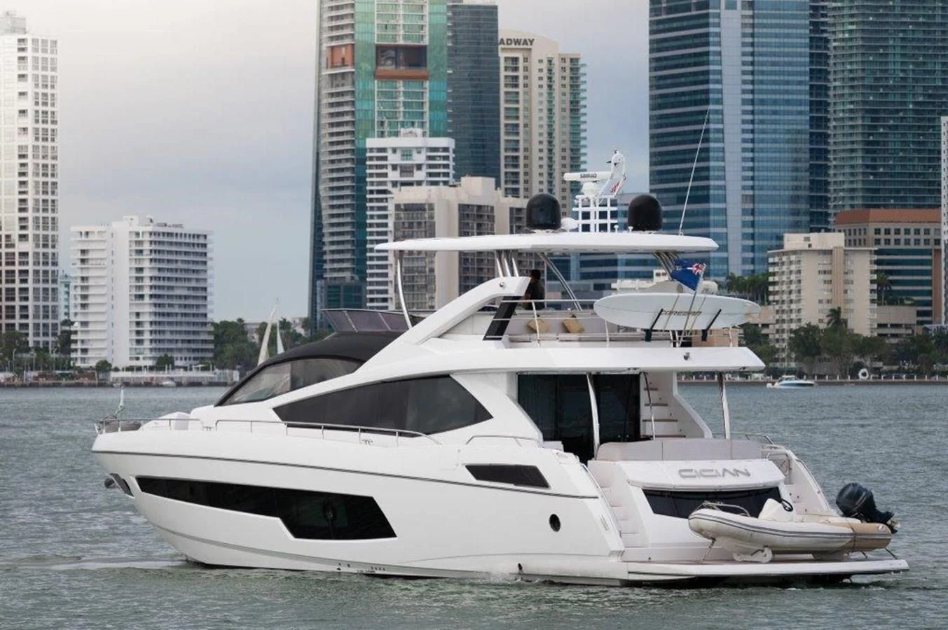 a white yacht in the water aboard SUNSEEKER 75 YACHT Yacht for Sale