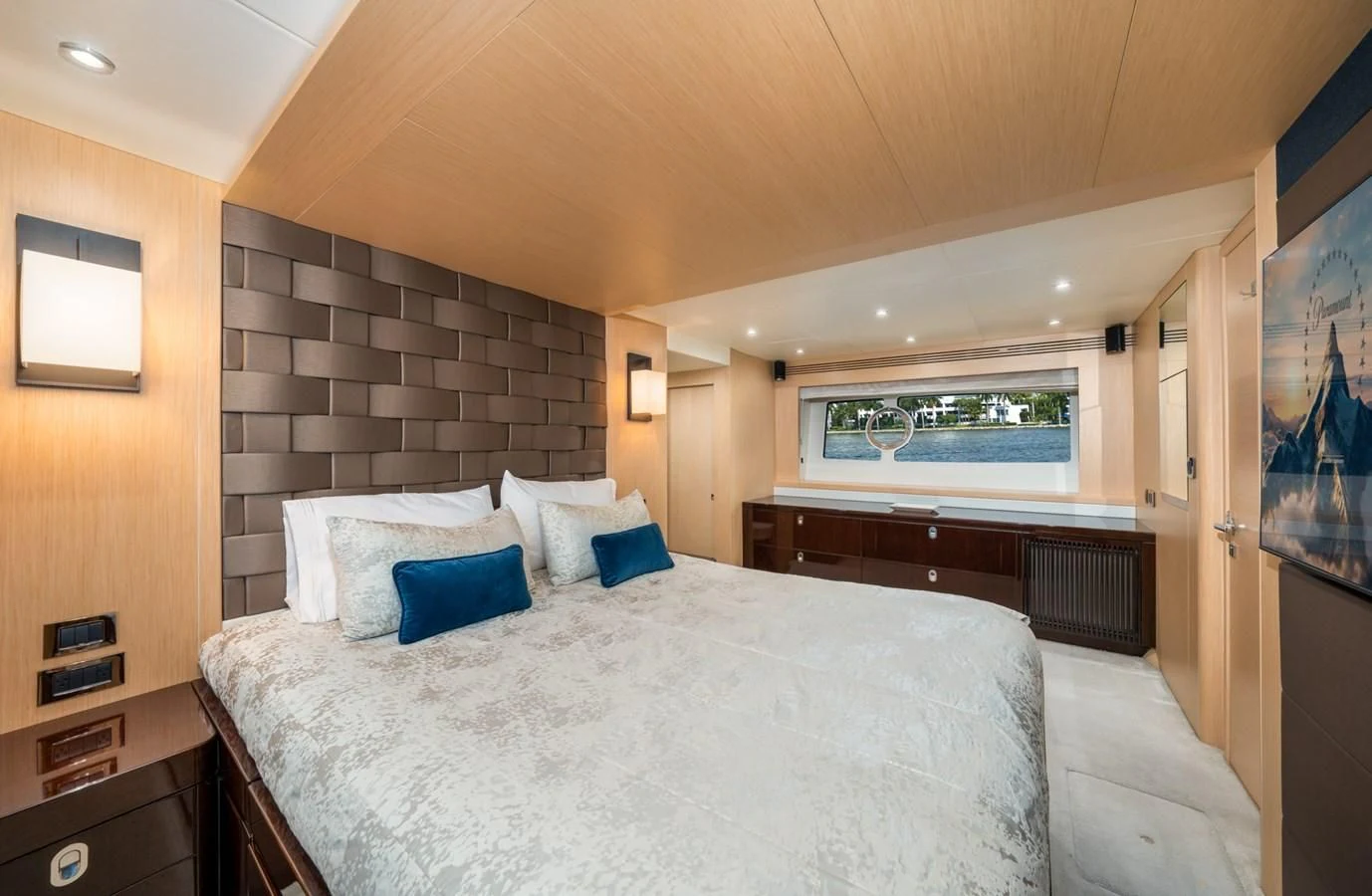 a large bed in a room aboard SUNSEEKER 75 YACHT Yacht for Sale