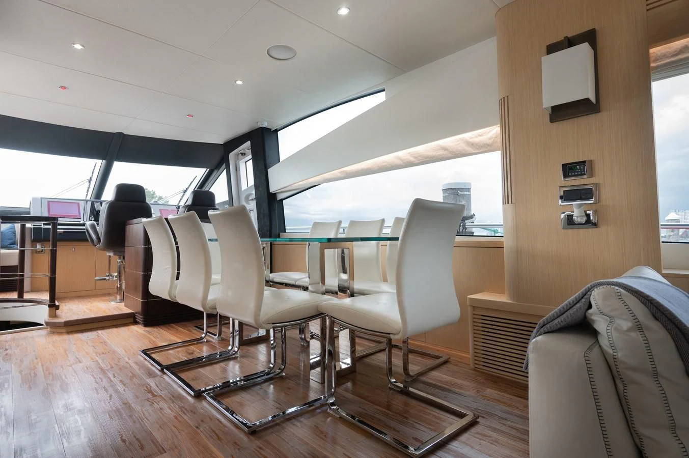 a room with chairs and a table aboard SUNSEEKER 75 YACHT Yacht for Sale