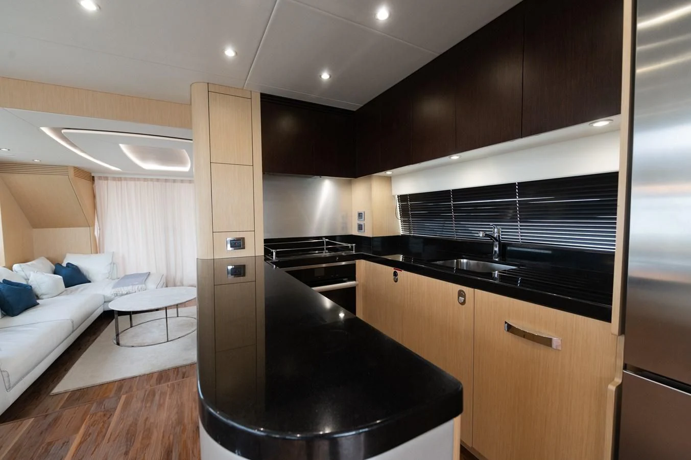 a kitchen with a black counter aboard SUNSEEKER 75 YACHT Yacht for Sale