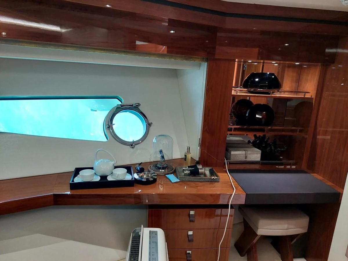 a room with a desk and a window aboard SUNSEEKER 75 YACHT Yacht for Sale