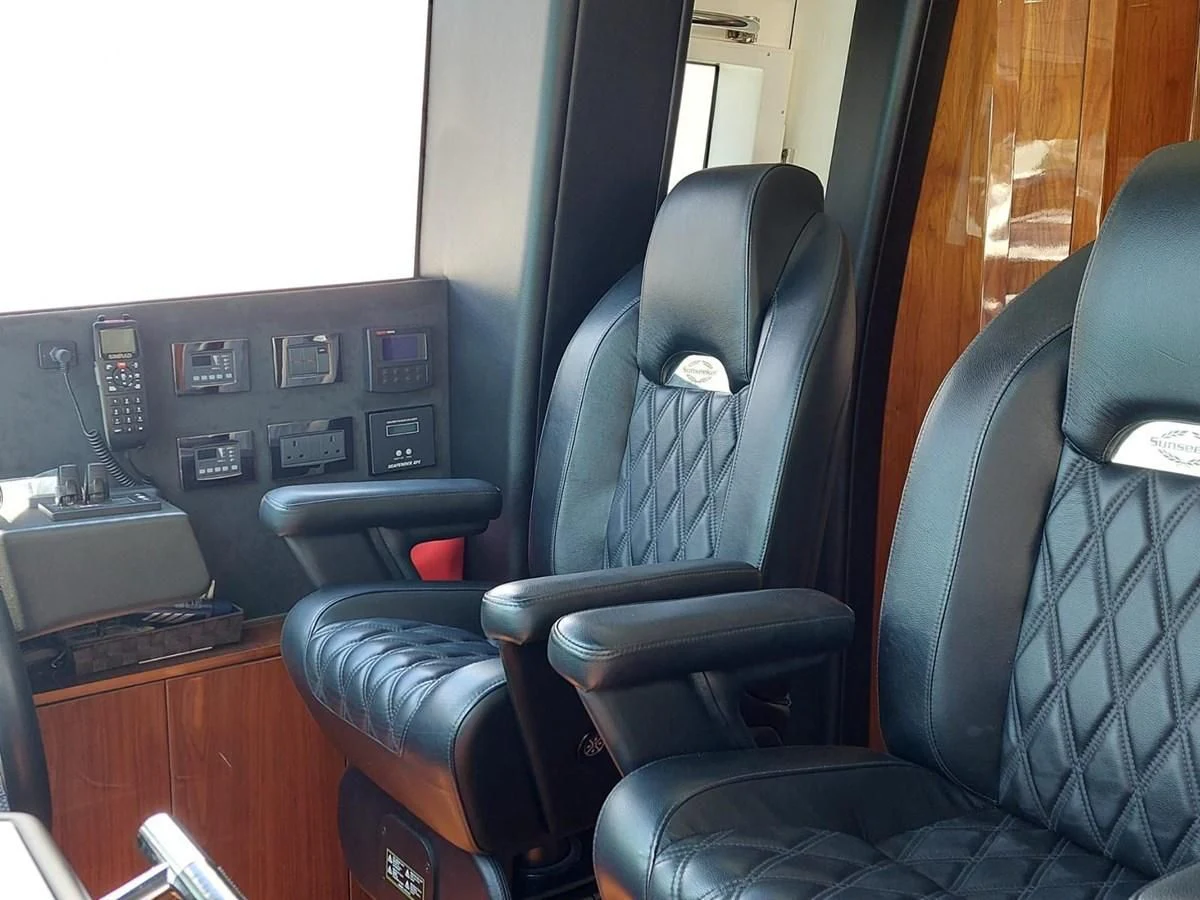 a group of seats in a vehicle aboard SUNSEEKER 75 YACHT Yacht for Sale