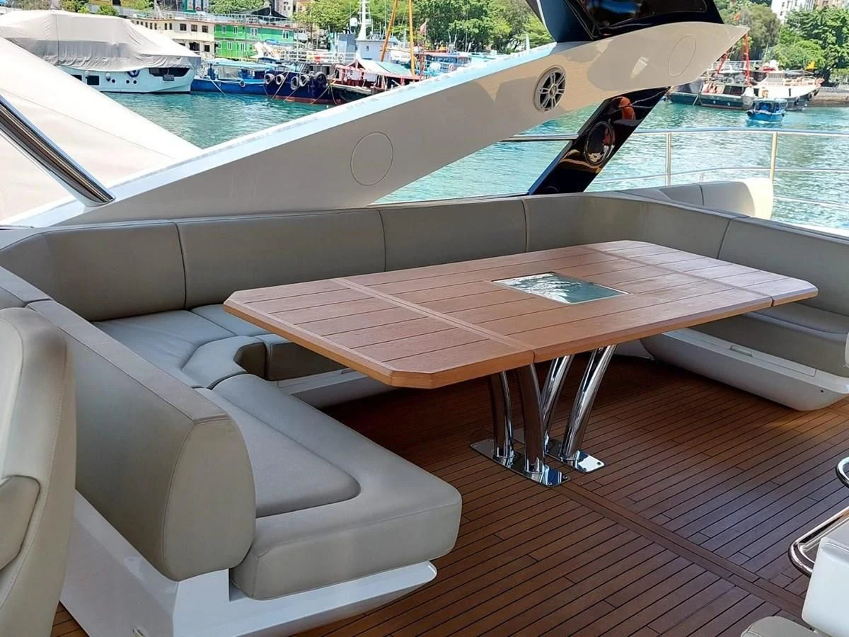 a table and chairs on a deck aboard SUNSEEKER 75 YACHT Yacht for Sale
