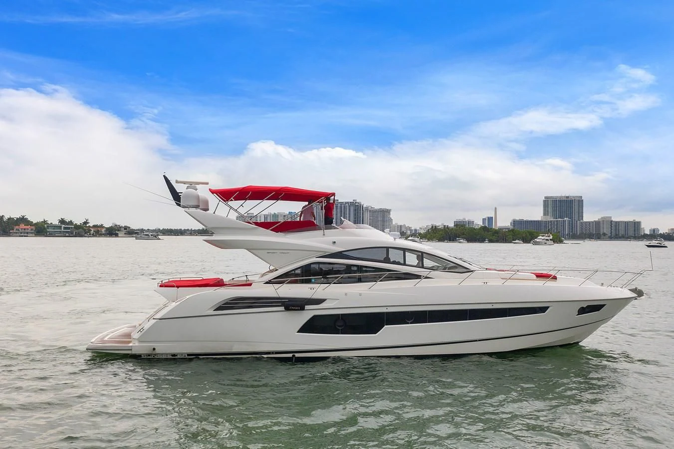 a white yacht in the water aboard SUNSEEKER 75 YACHT Yacht for Sale