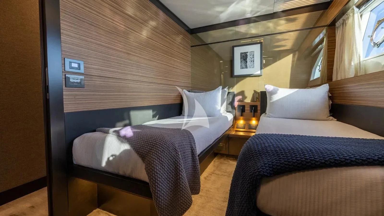 a room with beds and a table aboard DATE NIGHT Yacht for Sale