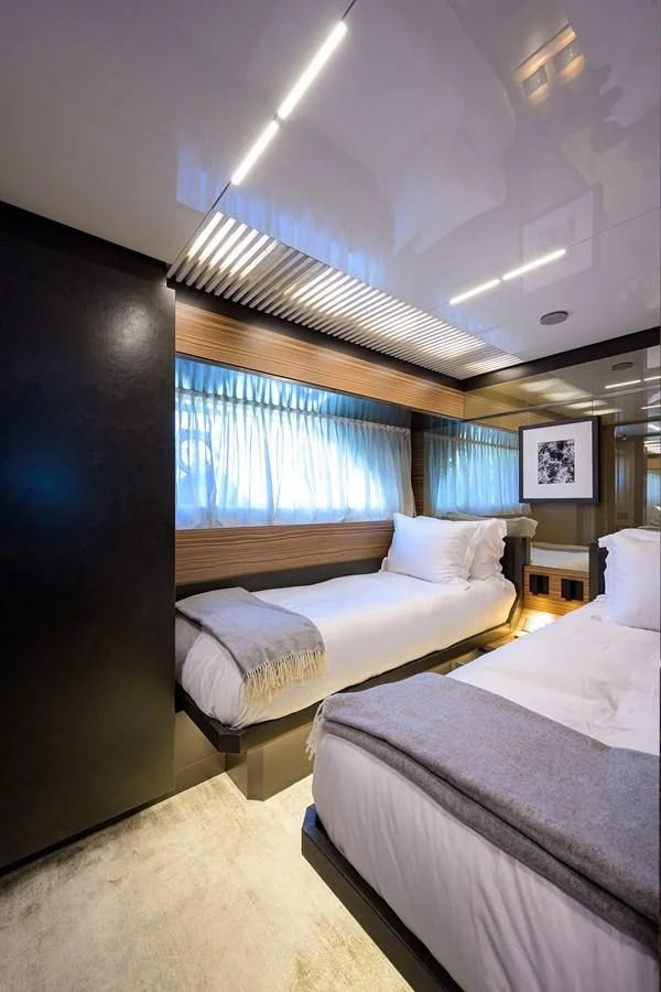 a room with two beds aboard DATE NIGHT Yacht for Sale