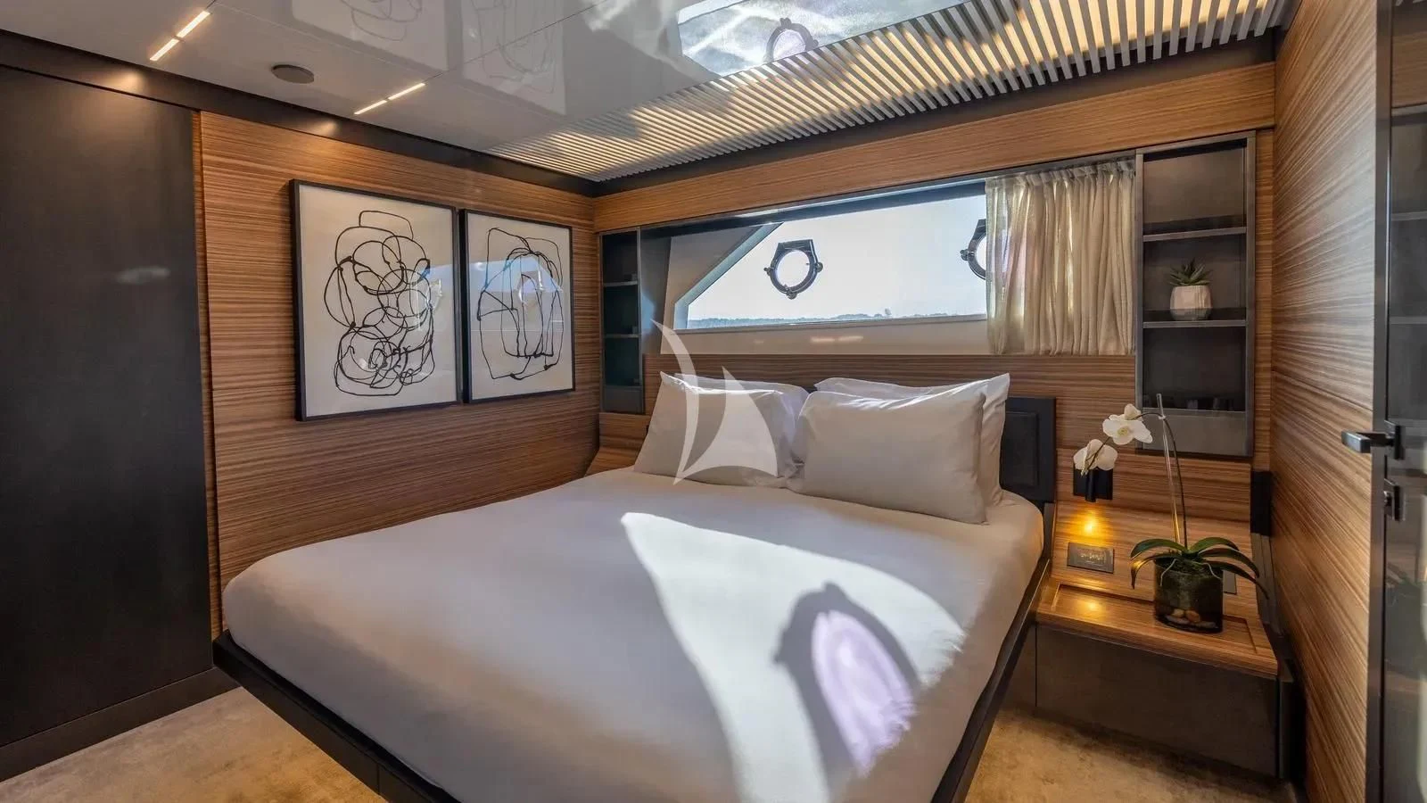 a bed with white sheets aboard DATE NIGHT Yacht for Sale