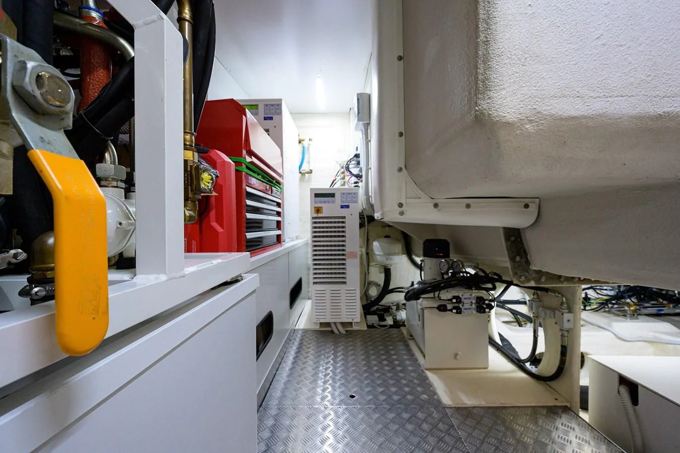 a machine in a room aboard DATE NIGHT Yacht for Sale