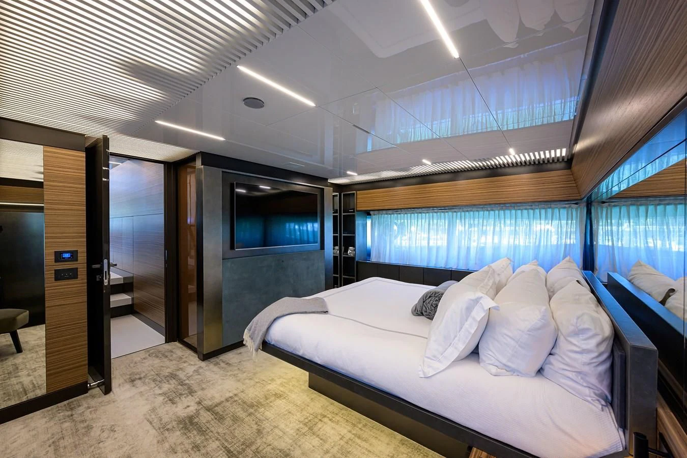 a large bed in a room aboard DATE NIGHT Yacht for Sale