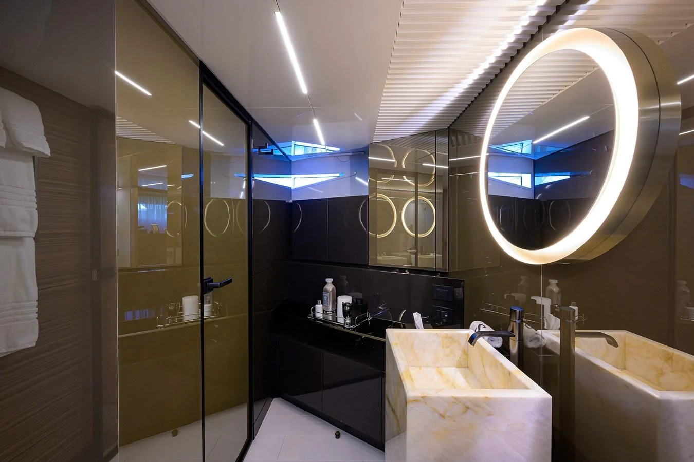 a bathroom with a large mirror aboard DATE NIGHT Yacht for Sale