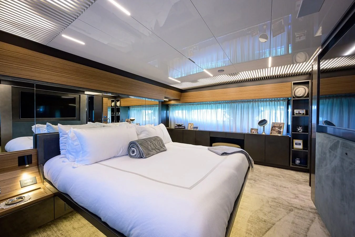 a room with a bed and a window aboard DATE NIGHT Yacht for Sale