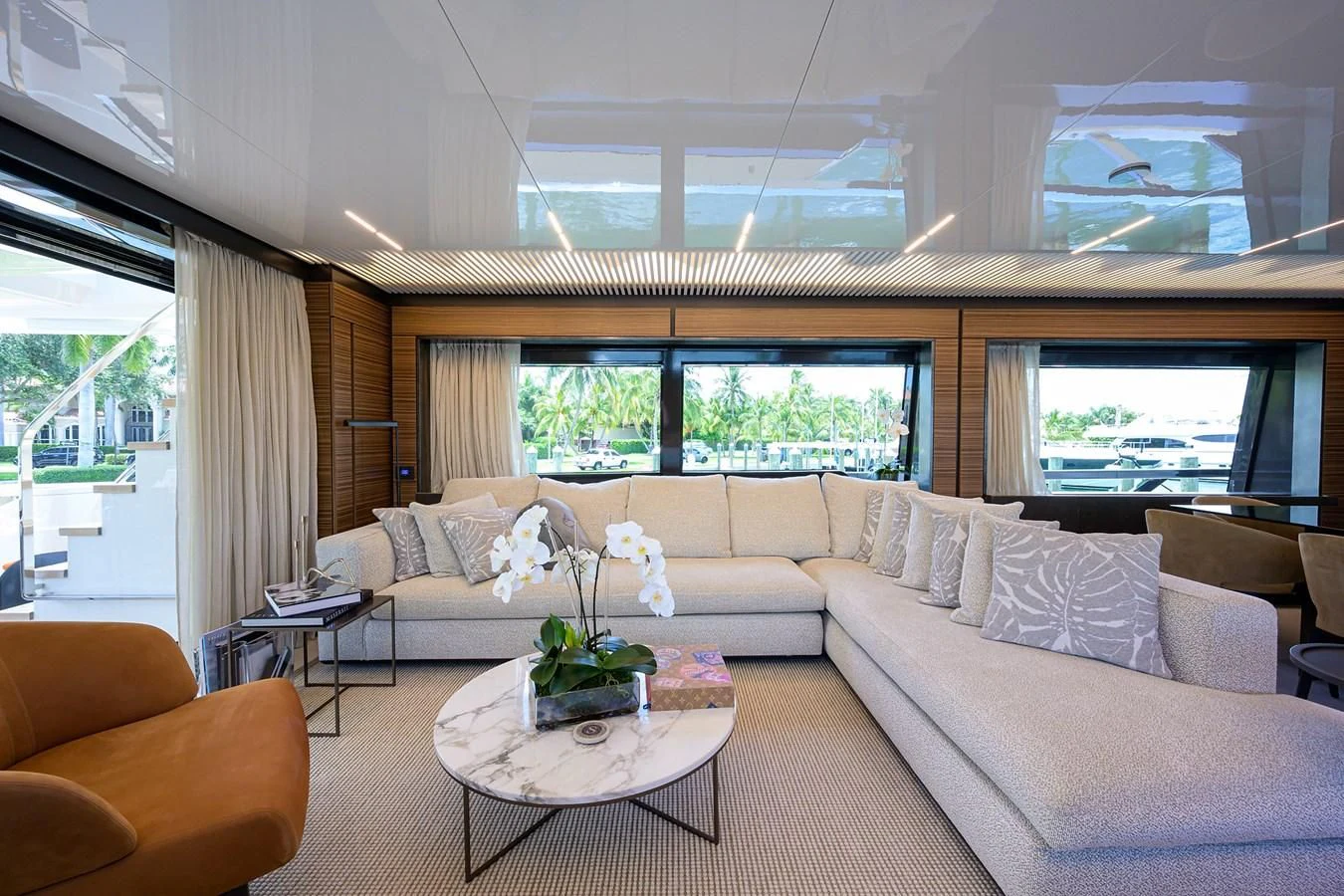 a living room with a couch and a table aboard DATE NIGHT Yacht for Sale